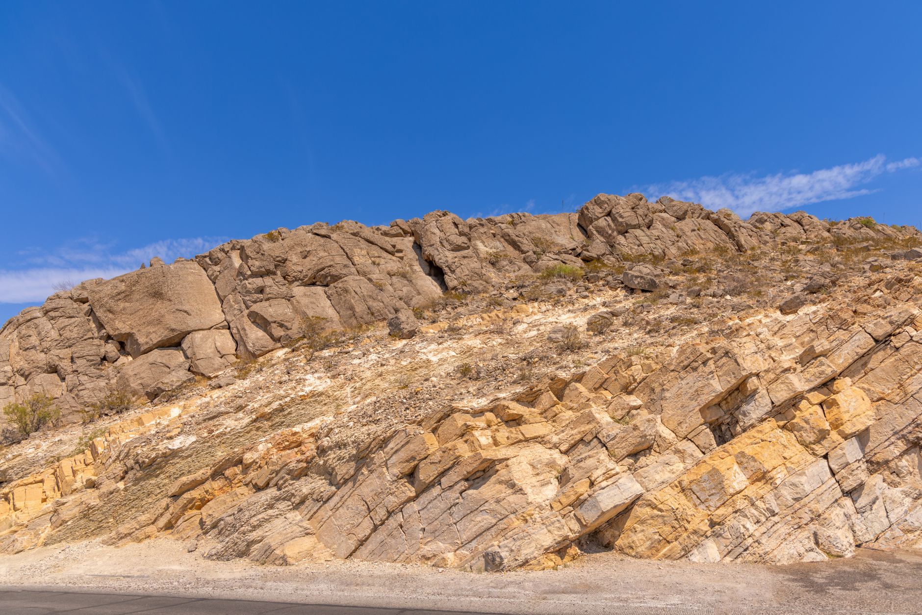 Rugged rocky landscape in El Paso, TX, showcasing arid natural beauty under a clear blue sky.